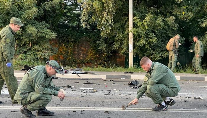 Investigators work at the site of a suspected car bomb attack that killed Darya Dugina, daughter of ultra-nationalist Russian ideologue Alexander Dugin, in the Moscow region, Russia August 21, 2022. — Reuters/File