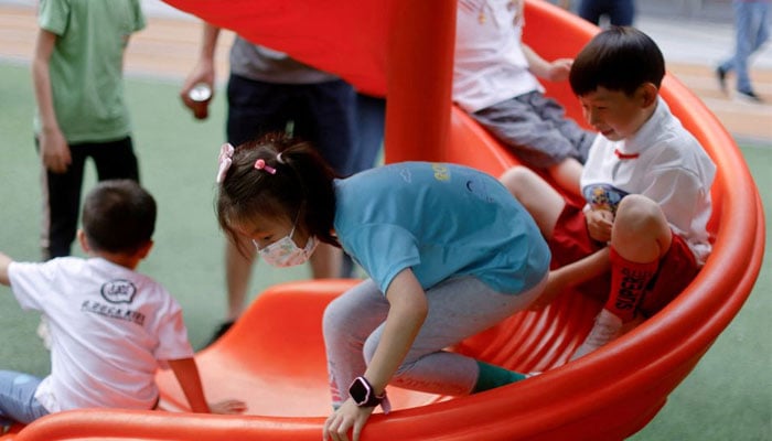 Children play at a playground inside a shopping complex in Shanghai, China June 1, 2021. — Reuters