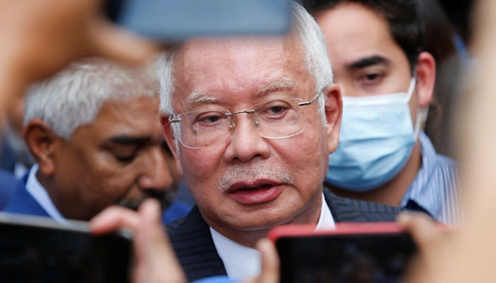 Former Malaysian Prime Minister Najib Razak speaks to journalists outside the Federal Court during a court break, in Putrajaya, Malaysia August 23, 2022. — Reuters