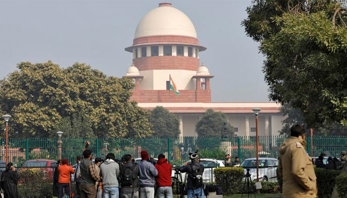 Television journalists are seen outside the premises of the Supreme Court in New Delhi, India, January 22, 2020. — Reuters/File