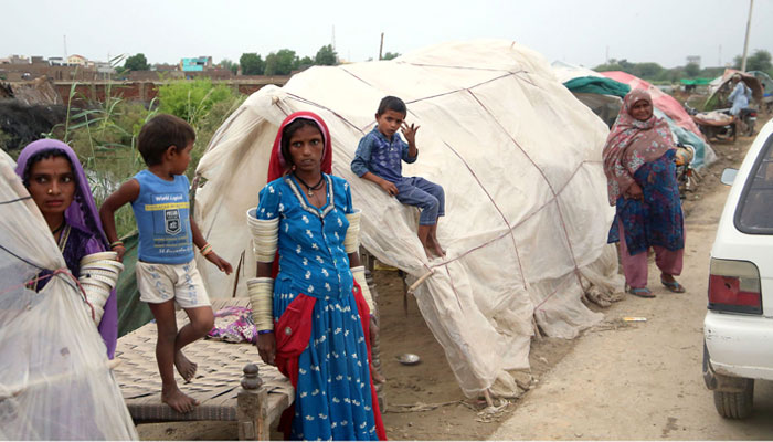 Displaced people live in makeshift shelters in Sanghar. — Online