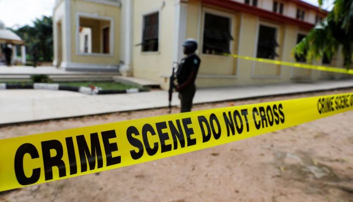 A police crime scene tape is seen in front of St. Francis Catholic Church where gunmen attacked worshippers during a Sunday mass service in Owo, Ondo, Nigeria, June 6, 2022. — Reuters