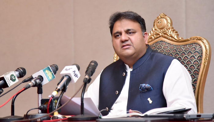 Minister for Information and Broadcasting Fawad Chaudhry addresses a press conference in Islamabad in this undated photo. — PID/File