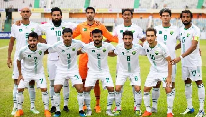 Pakistani football team players pose for a photo before a match. — PFF