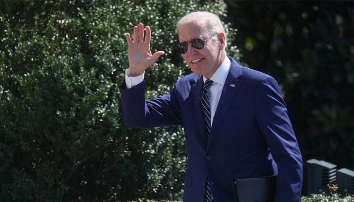 U.S. President Joe Biden greets people on South Lawn after arriving on Marine One from a trip to Delaware at the White House in Washington, U.S., August 24, 2022. — Reuters