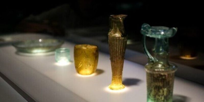 A photograph taken on August 24, 2022 shows the newly conserved ancient glass vessels damaged during the 2020 Beirut port explosion, and displayed at the British Museum in London — AFP