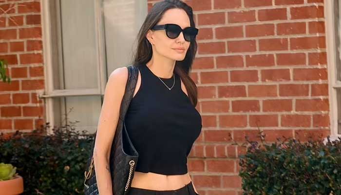 Angelina Jolie rocks Lara Croft-inspired tank top amid fight with Brad Pitt