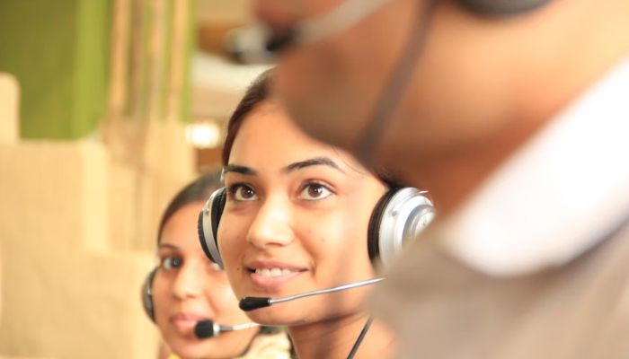 Woman in call centre. — Unsplash