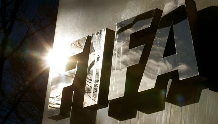 The sun is reflected in FIFAs logo in front of FIFAs headquarters in Zurich, Switzerland November 19, 2015. — Reuters/File