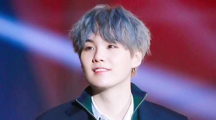 Is BTS Suga pretending to have a friendship tattoo?
