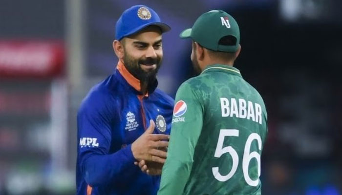 Indias Virat Kohli (left) and Pakistans captain Babar Azam