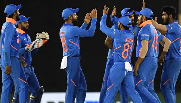 Indian cricket team players celebrate the wicket of Australia cricketer Usman Khawaja.— AFP