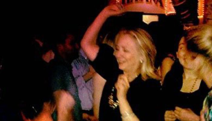 An old photo of Hillary Clinton where she can be seen dancing. — Twitter