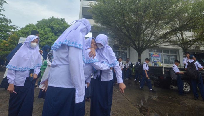 Students gather at an open area following an earthquake in Padang, West Sumatra province, Indonesia, August 29, 2022. — Reuters