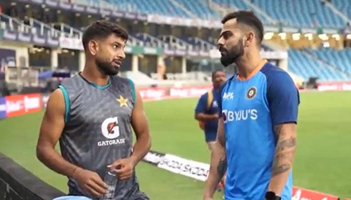 Pakistans Haris Rauf (L) and Indian batter Virat Kohli. — Twitter/@BCCI/File