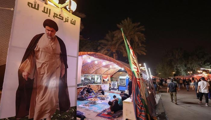 Supporters of Iraqi populist leader Moqtada al-Sadr gather for a sit-in, in front of Parliament, amid political crisis in Baghdad, Iraq August 24, 2022. — Reuters