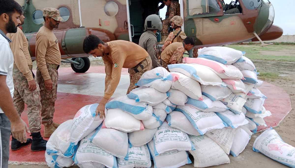 Soldiers load relief goods into an army helicopter during a relief operation, in Sawat, Pakistan August 29, 2022. — Reuters