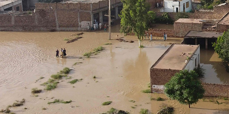 This aerial view shows a flooded residential area after heavy monsoon rains in Balochistan province on August 29, 2022. — AFP