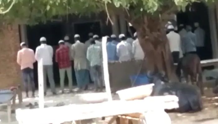 Muslim men offering prayer in group at home in Dulhepur Village. — NDTV