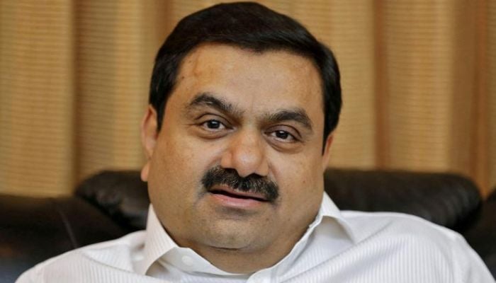 Indian billionaire Gautam Adani speaking at his office in the western Indian city of Ahmedabad in an April 2014. — CNN