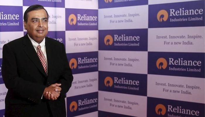 Mukesh Ambani, chairman of Reliance Industries Limited, poses for photographers before addressing the annual shareholders meeting in Mumbai, India, June 12, 2015. Indias Reliance Industries Ltd will start commercial 4G telecommunication services by December, Chairman Mukesh Ambani said on Friday.— Reuters