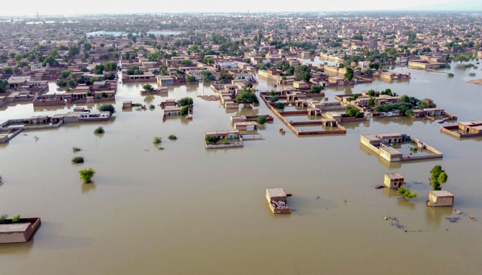 This aerial view shows a flooded residential area after heavy monsoon rains in Balochistan province on August 29, 2022. The death toll from monsoon flooding in Pakistan since June has reached 1,136, according to figures released on August 29 by the country´s National Disaster Management Authority. — AFP