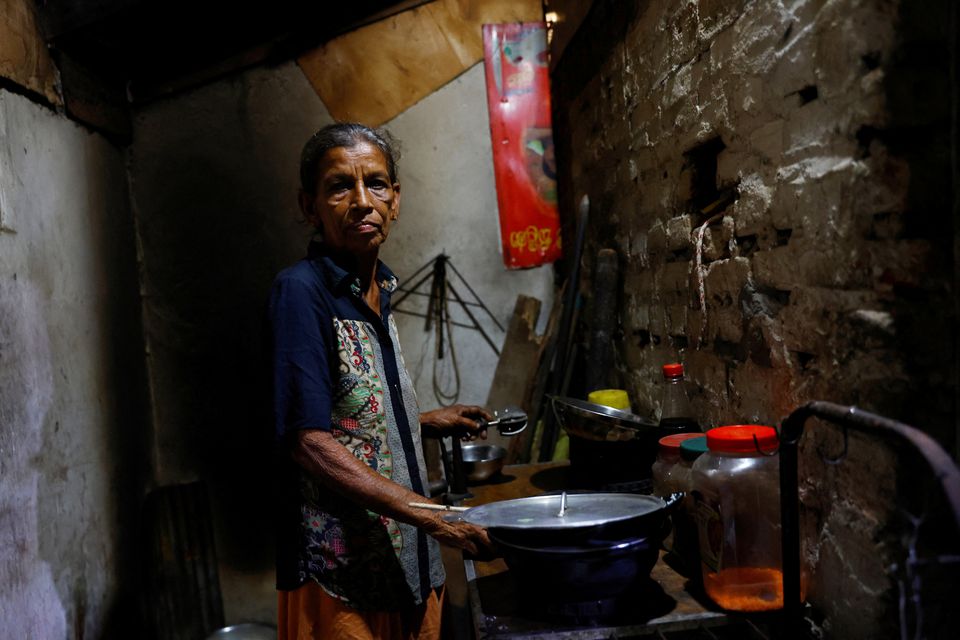 Manel Peiris, 68, poses in her kitchen, amid the countrys economic crisis, in Colombo, Sri Lanka, August 2, 2022. I am a heart patient and have to take medicine every day, she said. Hospitals used to issue medicine for three months. But with the onset of the economic crisis, hospitals dont have medicine and so we are asked to buy from pharmacies. But one months cost is around Rs 3,400 which I cant afford, so I buy only for one week at a time. Sometimes my husband has to borrow or get an advance from his workplace. — Reuters