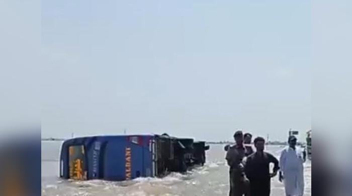 Floodwater overturns bus carrying 40 in Dadu