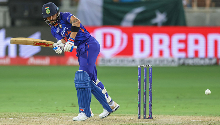 Indias Virat Kohli plays a shot during the Asia Cup Twenty20 international cricket Group A match between India and Pakistan at the Dubai International Cricket Stadium in Dubai on August 28, 2022. — AFP