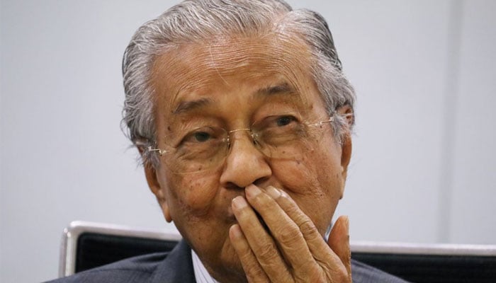 Malaysias former Prime Minister Mahathir Mohamad reacts during a news conference in Kuala Lumpur, Malaysia December 14, 2020.