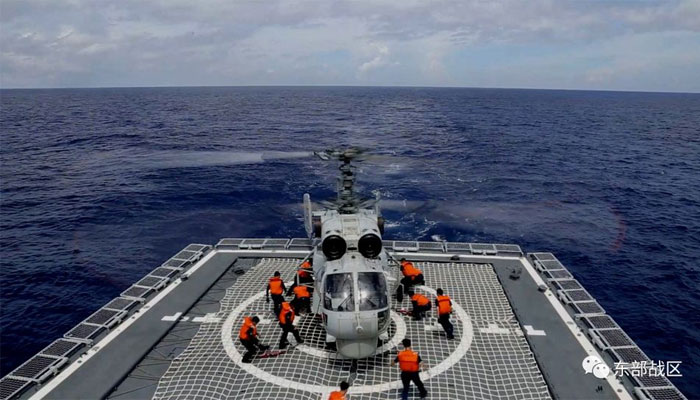 A Navy Force helicopter under the Eastern Theatre Command of Chinas Peoples Liberation Army (PLA) takes part in military exercises in the waters around Taiwan, at an undisclosed location August 8, 2022 in this handout picture released on August 9, 2022. — Reuters