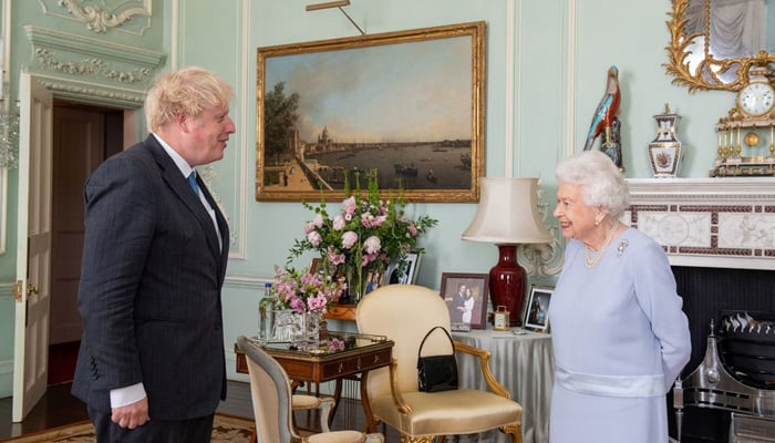 Britains Queen Elizabeth II greets Prime Minister Boris Johnson at the first in-person weekly audience with the Prime Minister since the start of the coronavirus pandemic, at Buckingham Palace in London, Briain June 23, 2021. — Reuters