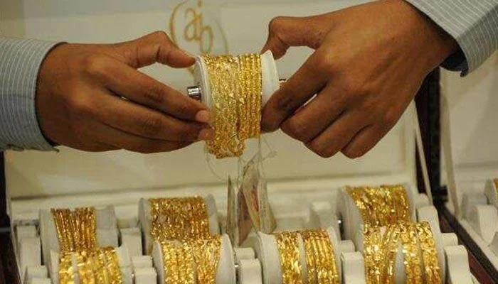 A representation image of gold bangles. &mdash; AFP/File