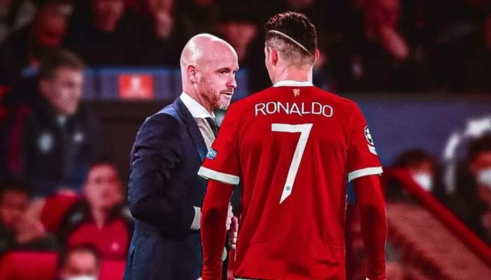 Manchester United manager Erik ten Hag (L) can be speaking to footballer Cristiano Ronaldo in this file photo. — Twitter/TimelineCR7