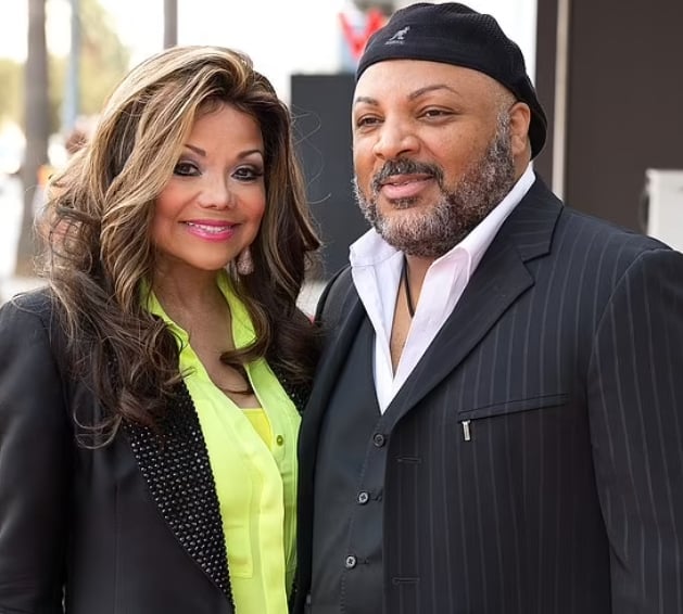 Film producer Jeffre Phillips, right, the former fiancé of La Toya Jackson, left, was accused of stealing personal items over a nine-day stretch at his Carolwood mansion after his death; seen in 2014