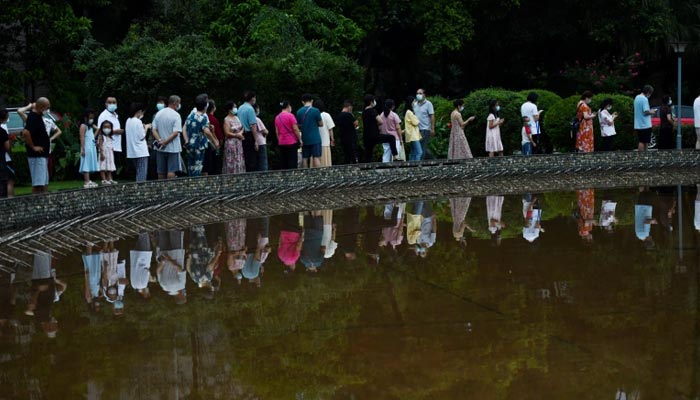 Residents line up for testing following the coronavirus disease outbreak in Chengdu in Sichuan province. — Reuters