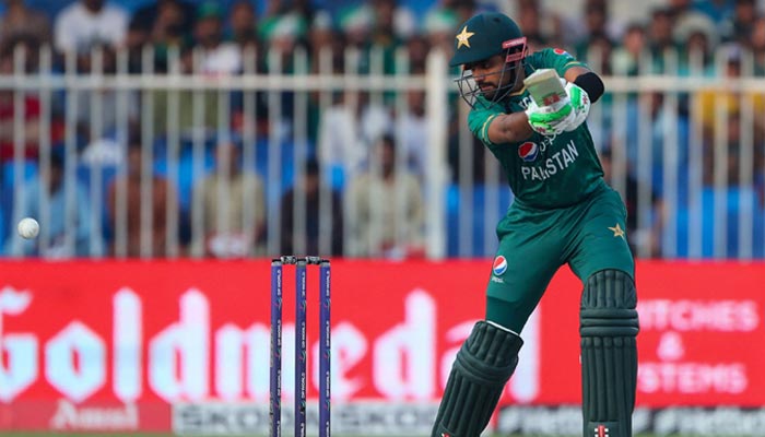 Pakistans captain Babar Azam plays a shot during the Asia Cup Twenty20 international cricket match between Pakistan and Hong Kong at the Sharjah Cricket Stadium in Sharjah on September 2, 2022. — AFP