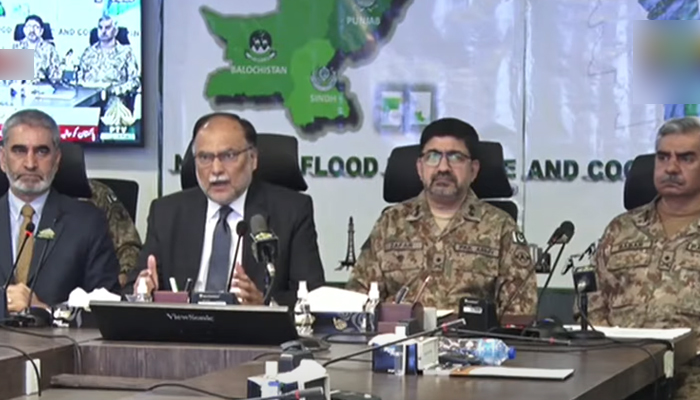 Minister for Planning Ahsan Iqbal addresses a press conference alongside military officials at the National Flood Response and Coordination Centre in Islamabad, on September 3, 2022. — YouTube/PTV