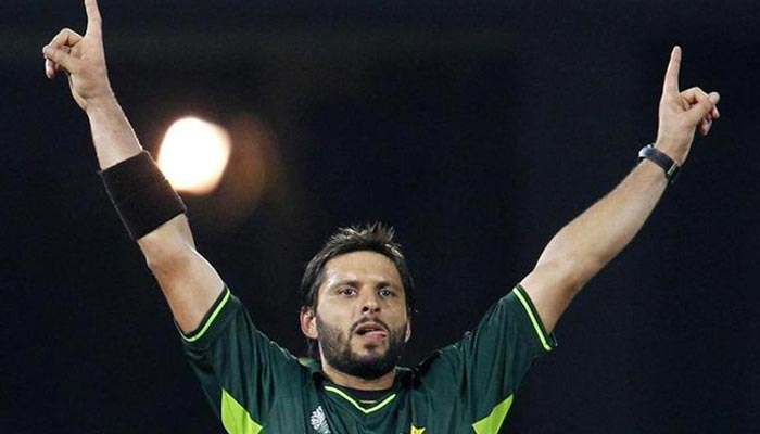 Pakistans captain Shahid Afridi celebrates taking the wicket of Canadas Rizwan Cheema during their ICC Cricket World Cup group A match in Colombo. — Reuters
