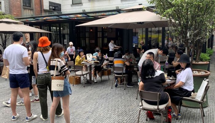 People dine outdoors at a restaurant during the Dragon Boat Festival, the first public holiday in the city since the lockdown for the coronavirus disease (COVID-19) outbreak was lifted, in Shanghai, China June 3, 2022. — Reuters