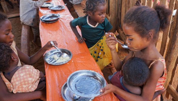 Malagasy children eat a meal at the Avotse feeding program that benefits malnourished children with hot meals in Maropia Nord village in the region of Anosy, southern Madagascar September 30, 2021. — Reuters