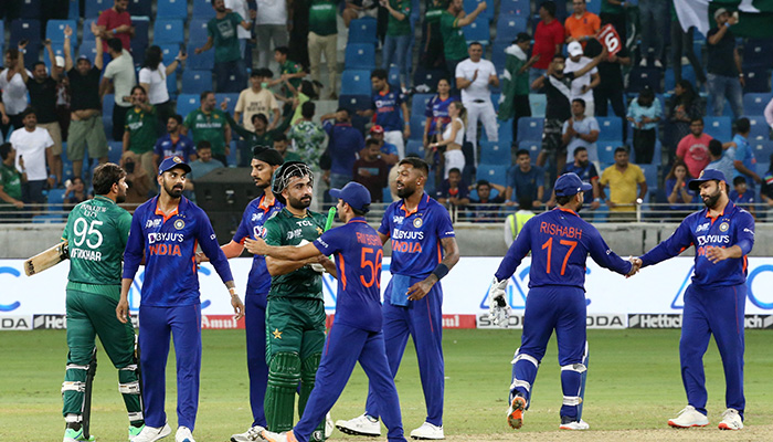 Cricket - Asian Cup - India v Pakistan - Dubai International Stadium, Dubai, United Arab Emirates - September 4, 2022 Players shake hands after the match. — Reuters
