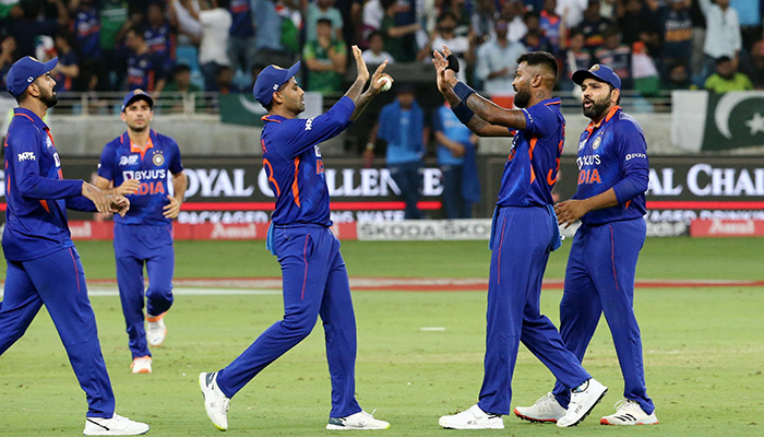 Cricket - Asian Cup - India v Pakistan - Dubai International Stadium, Dubai, United Arab Emirates - September 4, 2022, Indias Suryakumar Yadav celebrates with teammates after taking a catch to dismiss Pakistans Mohammad Rizwan off the bowling of Indias Hardik Pandya. — Reuters