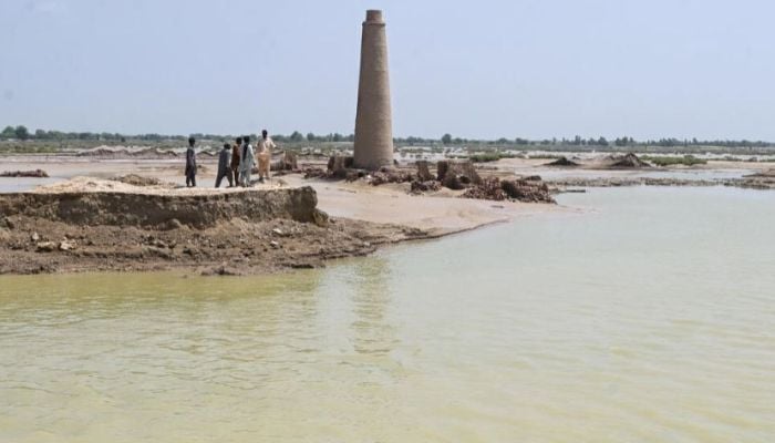 Though the floods that engulfed Aqilpur and its surrounding fields have receded from the highs of a week ago, the kilns are still surrounded by water. — AFP