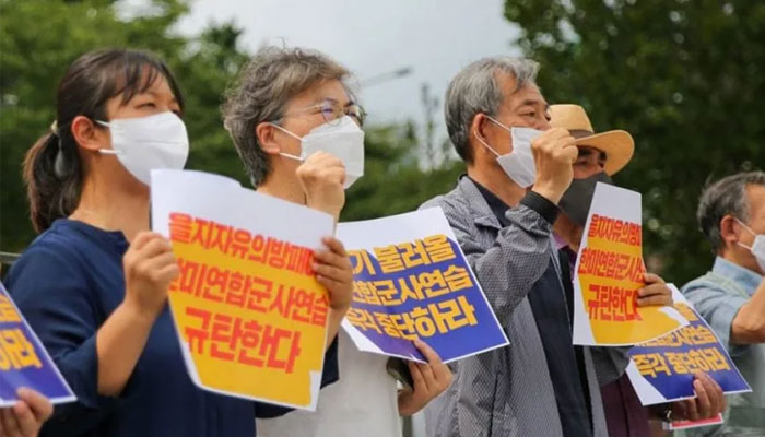 This file photo shows middle-aged protesters rallying in the capital Seoul against joint South Korea-United States military exercises. — Xinhua
