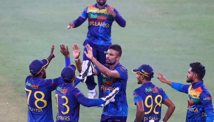 Sri Lankas players celebrate after dismissing Indias Hardik Pandya (not pictured) during the Asia Cup Twenty20 international cricket Super Four match between India and Sri Lanka at the Dubai International Cricket Stadium in Dubai on September 6, 2022. — AFP