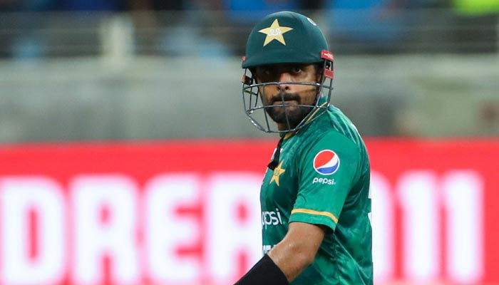 Pakistans captain Babar Azam leaves the field after being dismissed during the Asia Cup Twenty20 international cricket Super Four match between India and Pakistan at the Dubai International Cricket Stadium in Dubai on September 4, 2022. — AFP