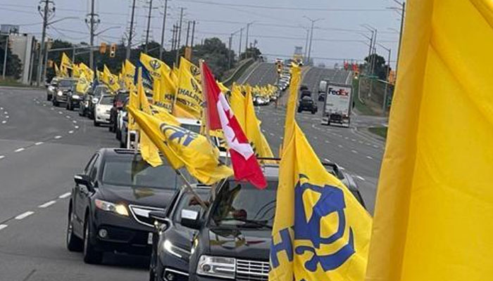 A long trail of cars drive during a rally in support of the Khalistan movement. — Photo by reporter