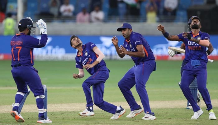 Indias players react to a throw during the Asia Cup Twenty20 international cricket Super Four match between India and Sri Lanka at the Dubai International Cricket Stadium in Dubai on September 6, 2022. — AFP