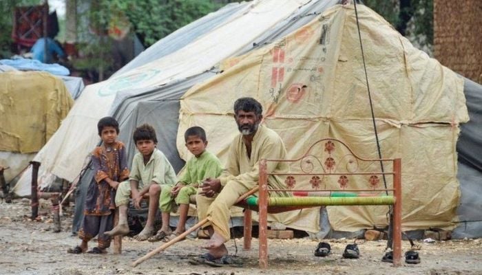 Large swathes of Pakistan have been affected - including these people in Jafarabad in Balochistan — Rueters